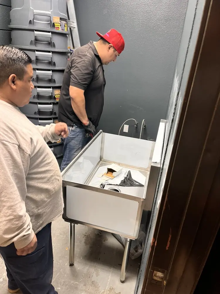 Commercial plumbing and sink installation in Milan